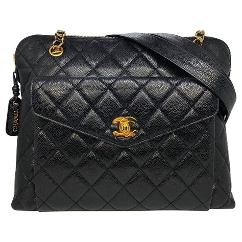 chanel black quilted leather shoulder bag gold hardware|Chanel black quilted flap bag.